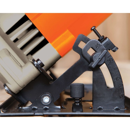 Close-up photo of BLACKDECKER CS1024 angle adjustment mechanism on power tool, showing detailed gauge markings.